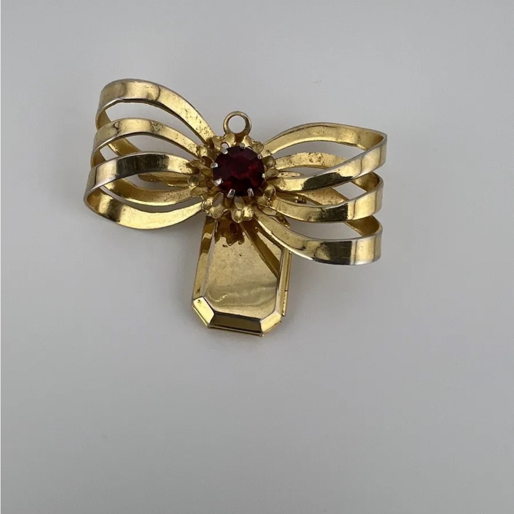 Vintage Gold Tone Bow Locket Garnet Birthstone Brooch. Used. Jewelry, Accessory.